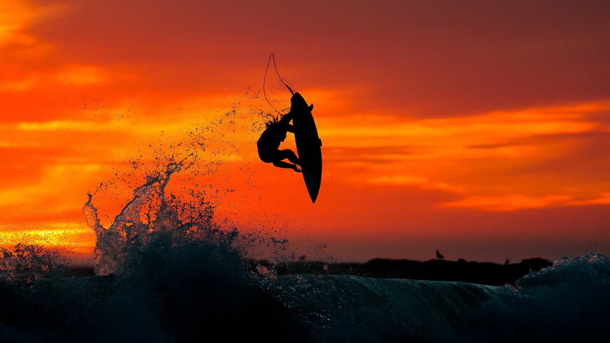 surfing woda morze skok zachód słońca