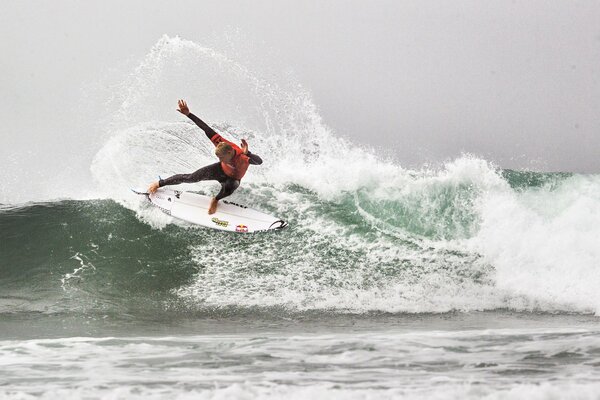 Conqueror of waves on a surfboard