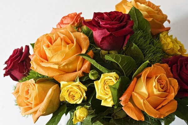 Bouquet of different roses with greenery