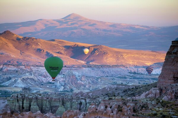 Kraevid with balloons in Cappadocia