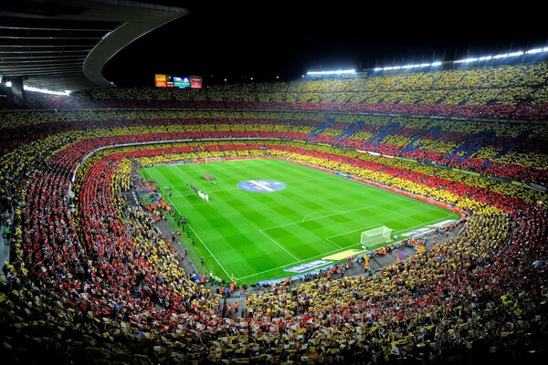 Estadio con aficionados al fútbol