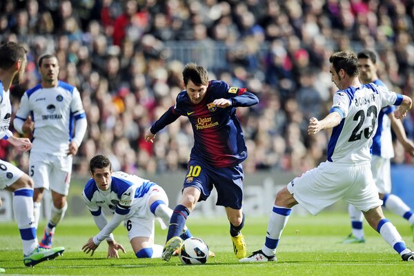 Dribbling the ball by Barcelona players