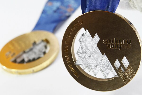 Macro image of the gold medal of the Sochi 2014 Olympic Games