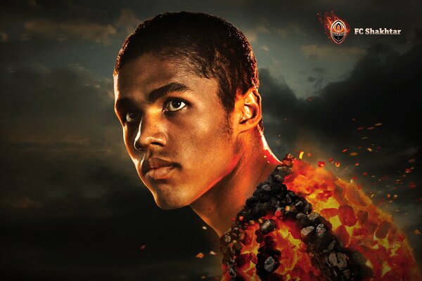 Imagen del futbolista Douglas costa rodeado de fuego