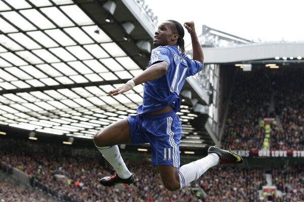 Didier Drogba célèbre sa victoire et son but marqué