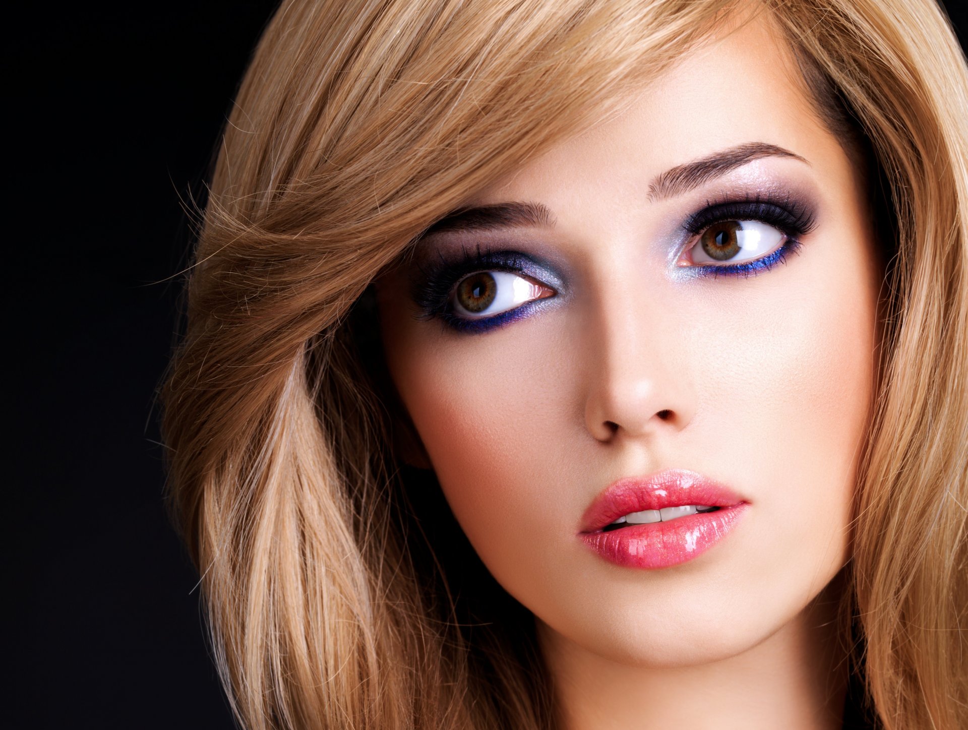 girl blonde make-up view eyes lips black background