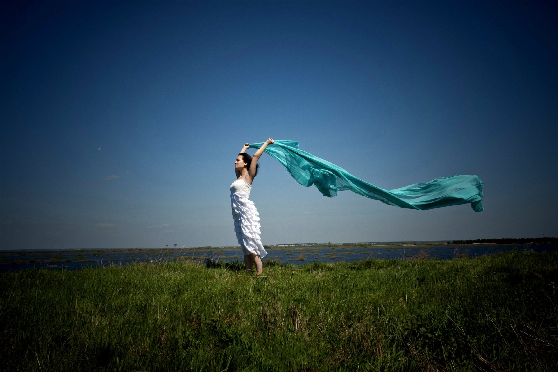 brown hair dress shawl cloth wind background grass lake horizon sky space