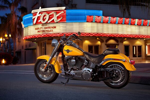 Bright yellow motorcycle in the city center