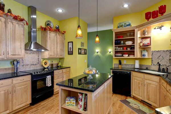 Bright equipped kitchen in yellow tones