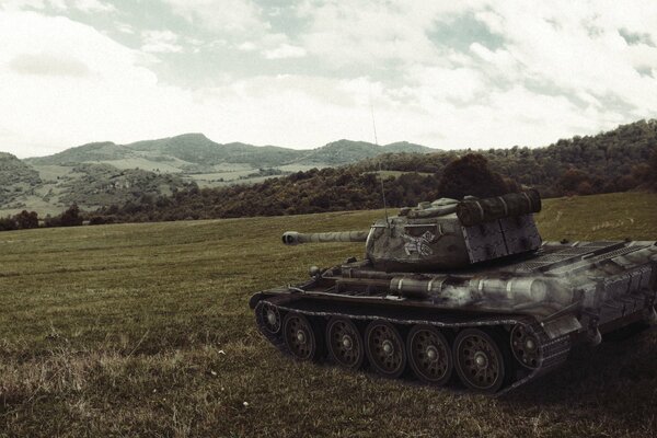 View of the t-44 tank on the background of a field and hills