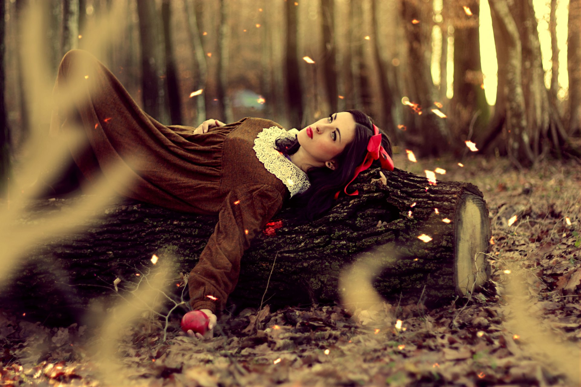 girl is make-up red lips hair snow white apple nature autumn leaves tree