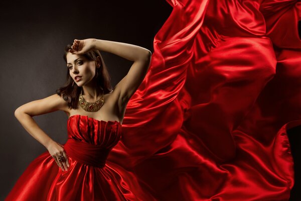 Girl model in a red dress