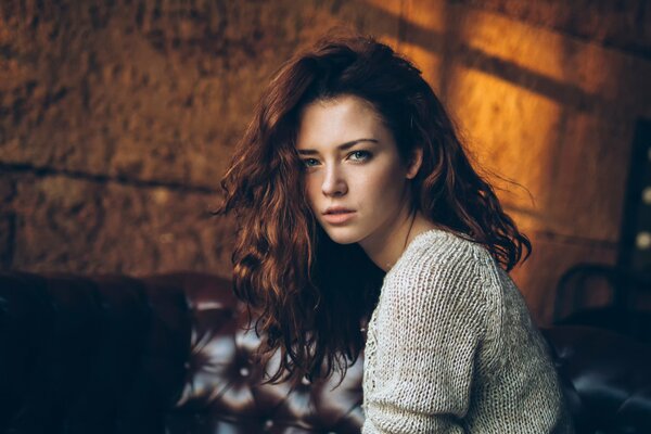 Portrait shooting of a girl in a sweater