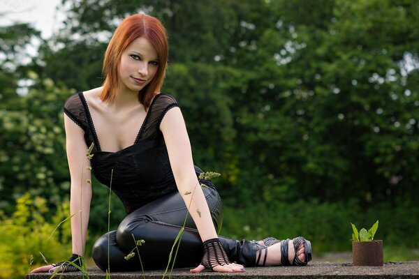 Red-haired girl and nature