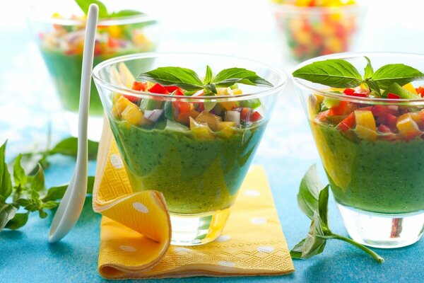 Fruit desserts in glasses on a napkin