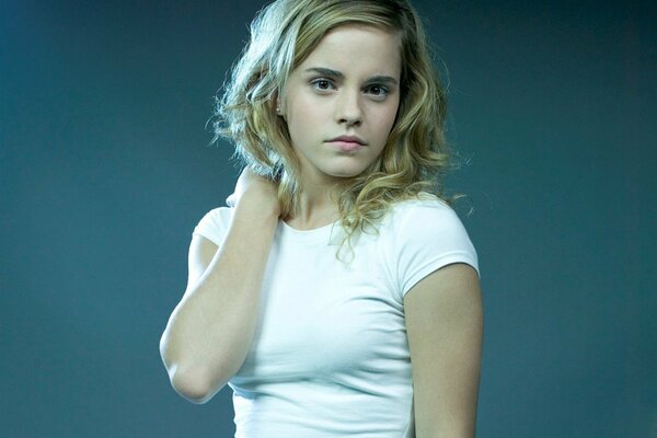 Emma Watson poses in a white T-shirt