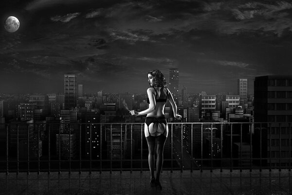 The girl looks at the black and white city