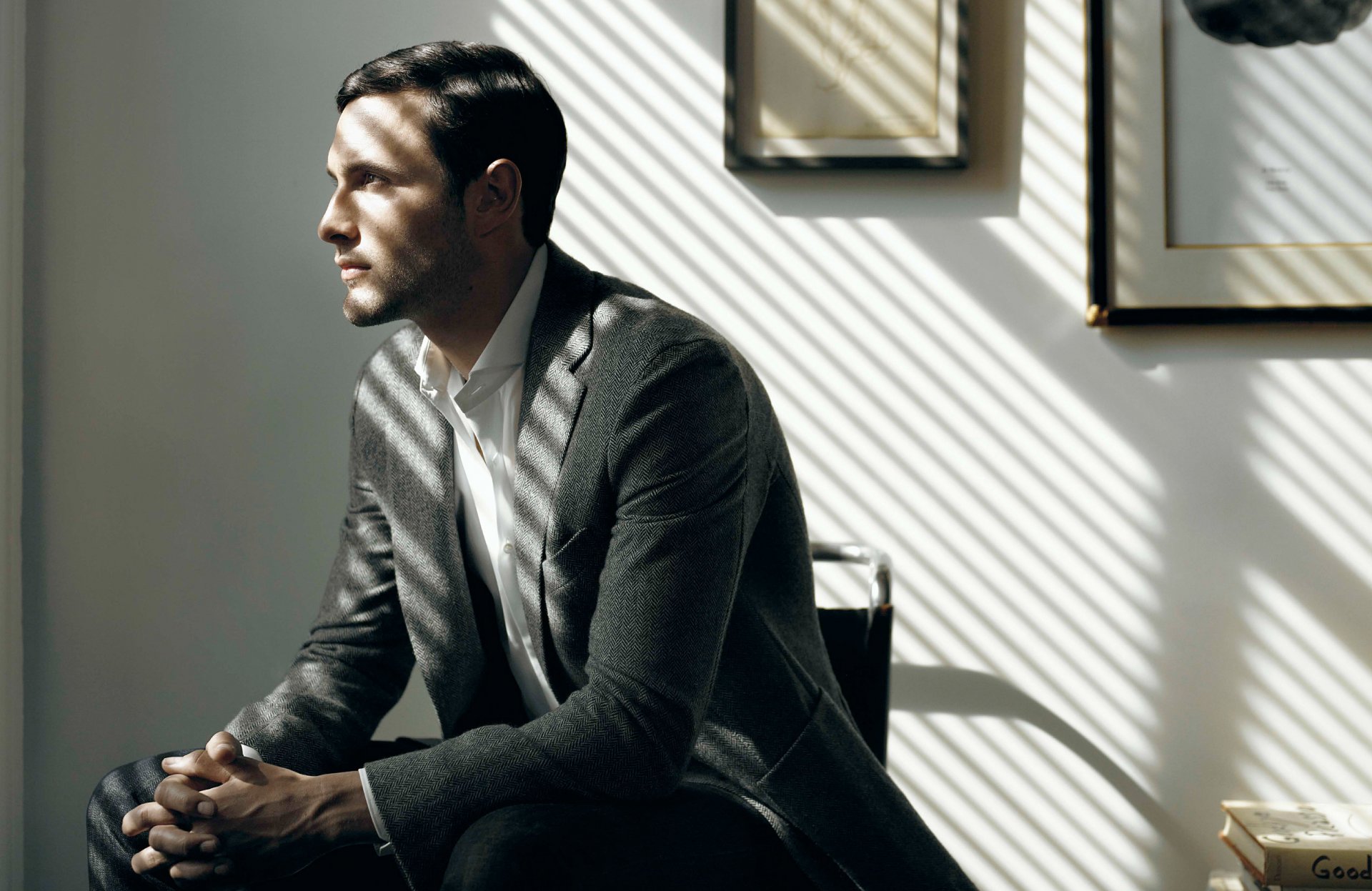 noah mills men suit section sitting