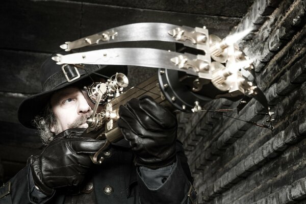 A man with a crossbow in his hands and burning arrows