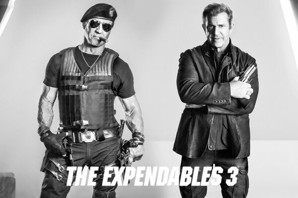 Actors Mel Gibson and Sylvester Stallone from The Expendables 3