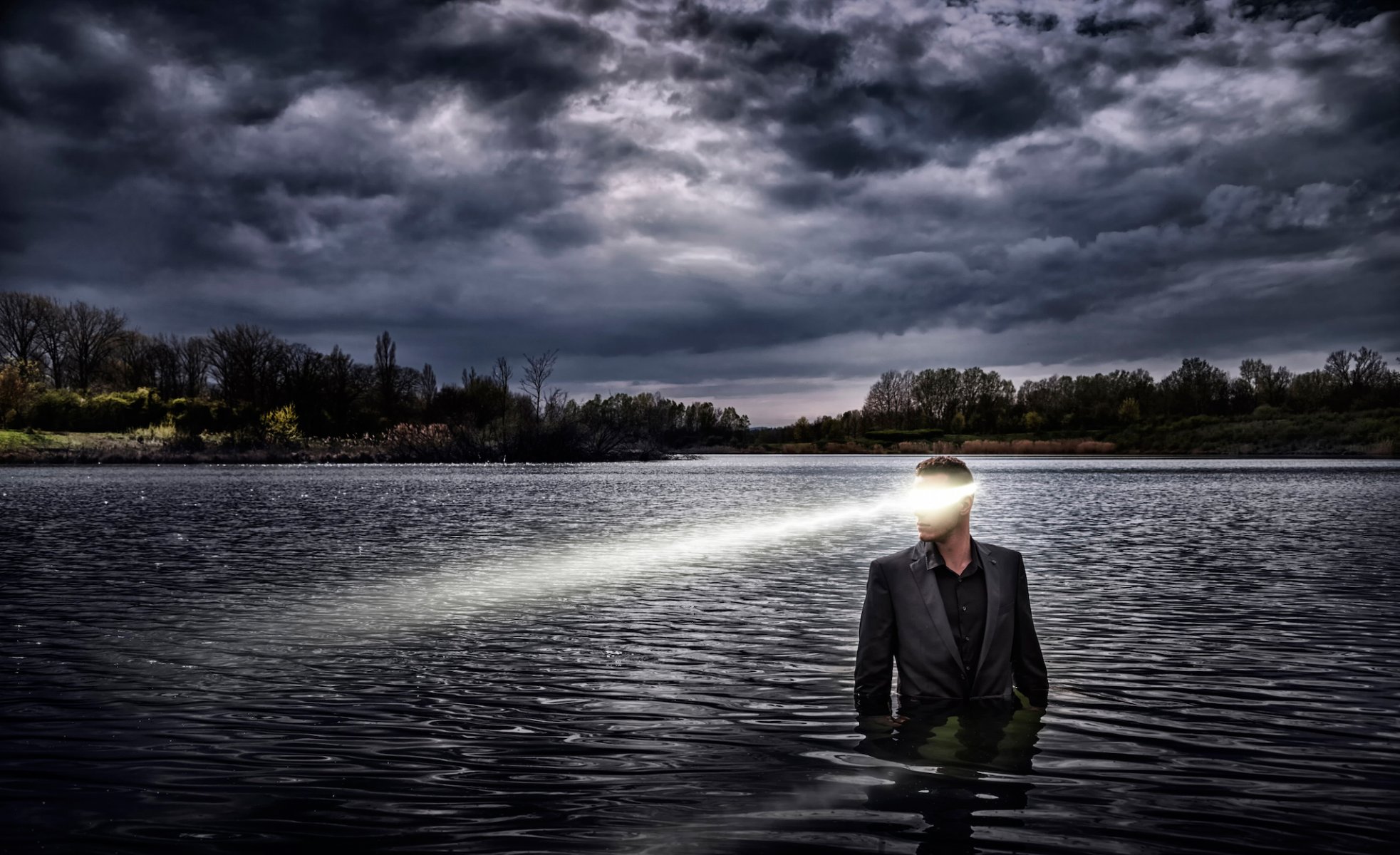 cold lake guy suit in water view rays eric bayard