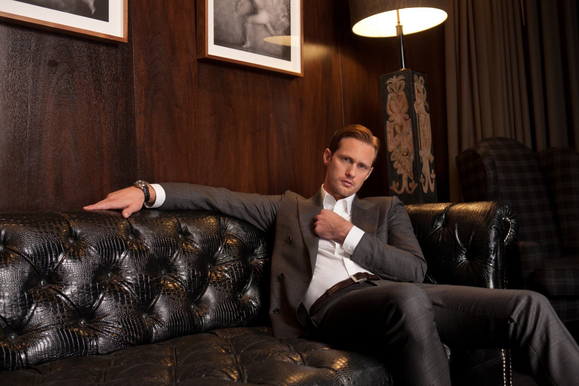 alexander skarsgard alexander skarsgard man screenwriter suit jacket shirt watch look lamp sofa leather