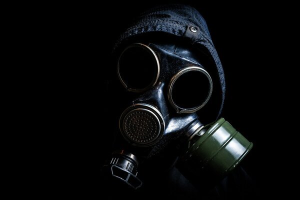 The man in the hood wore a gas mask