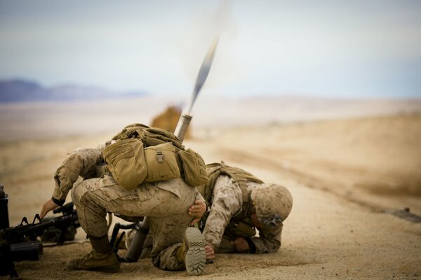 Soldiers hiding from bullets