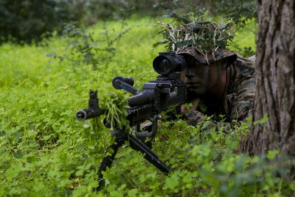 A soldier with a gun, ready to defend his homeland