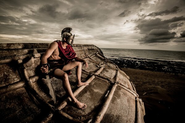 A man in a helmet looks at the horizon