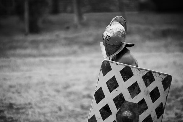 Black and white photo of a gladiator in uniform