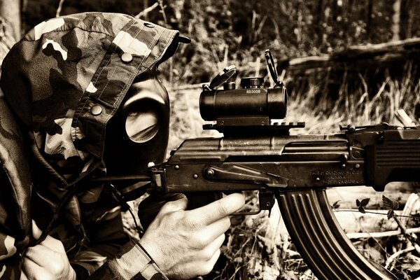 A military man in an ambush with a machine gun