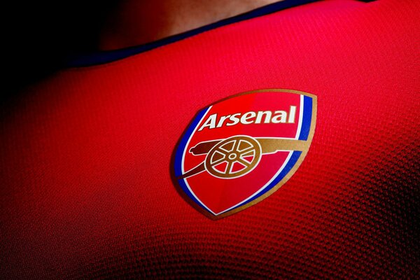 Arsenal club logo on a red background