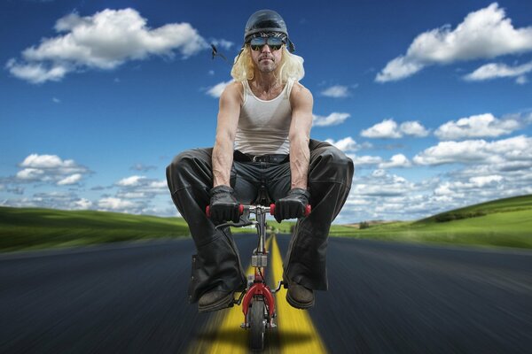 A man rides a bicycle on the road