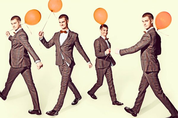 Photo shoot of men with red balloons