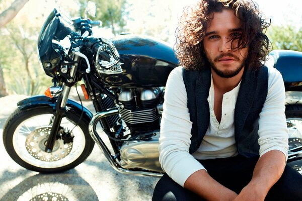 Photo shoot of a guy with a motorcycle in the afternoon