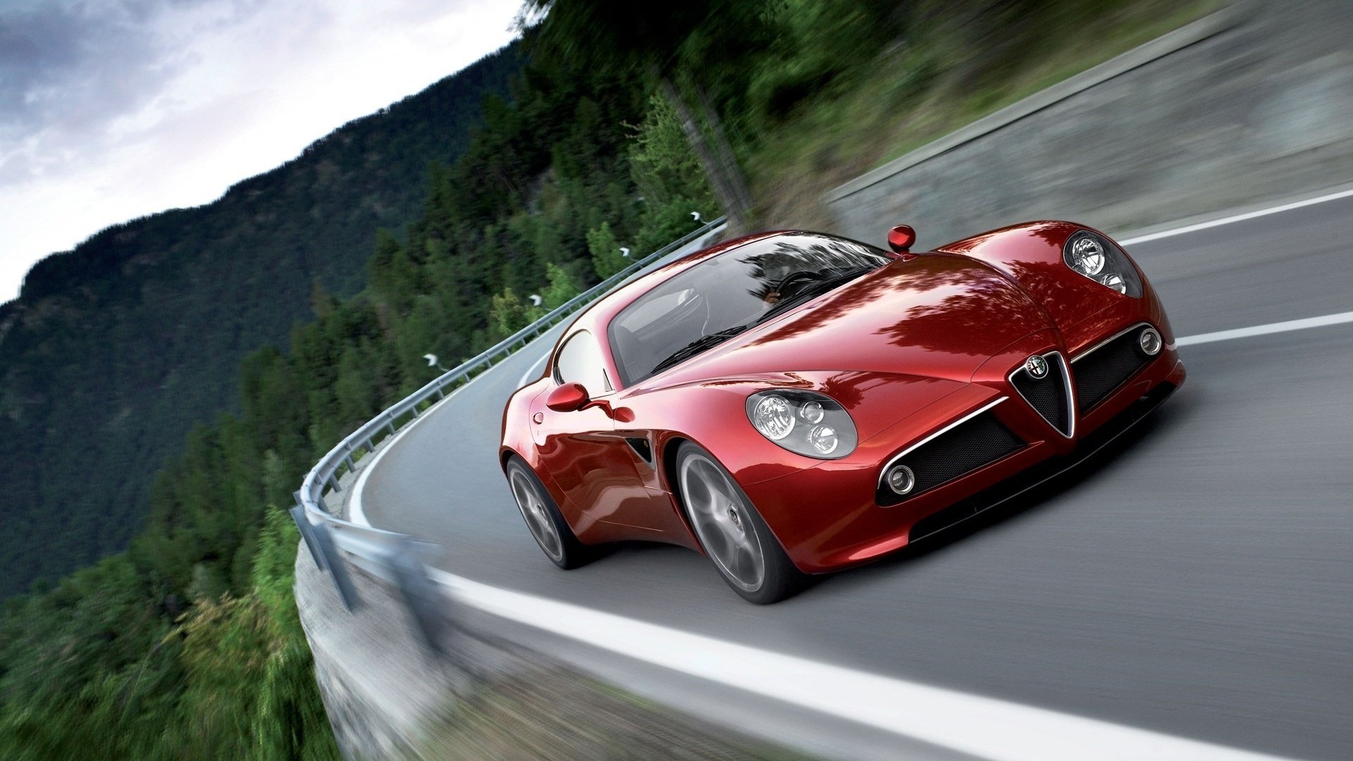 alfa romeo rosso strada montagna velocità