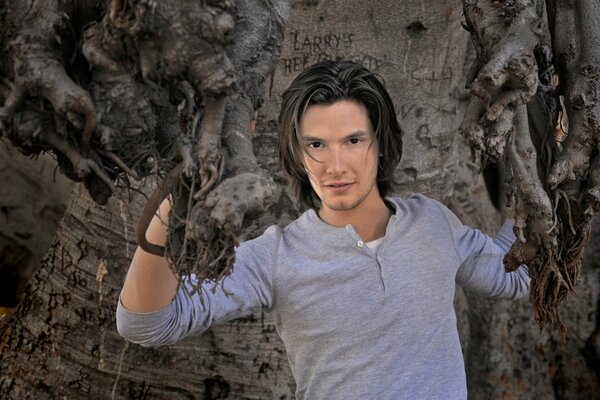 Photo shoot of Ben Barnes in the roots of a tree