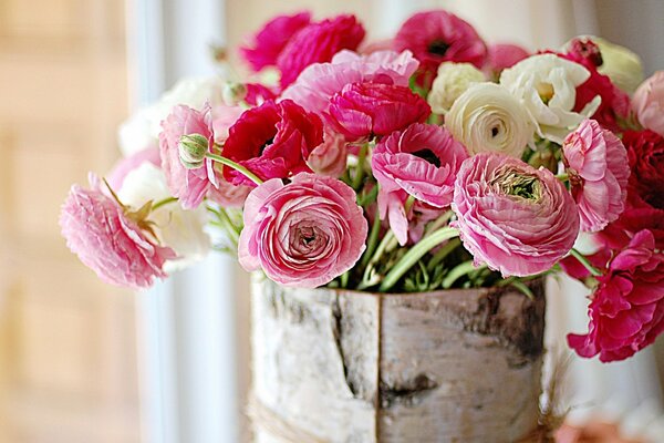 Peonies in a birch bark vase