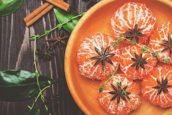 Beautifully decorated tangerines on a plate