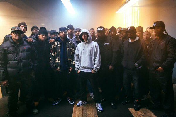 A group of young people in black clothes