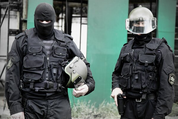 Masked and uniformed fighters