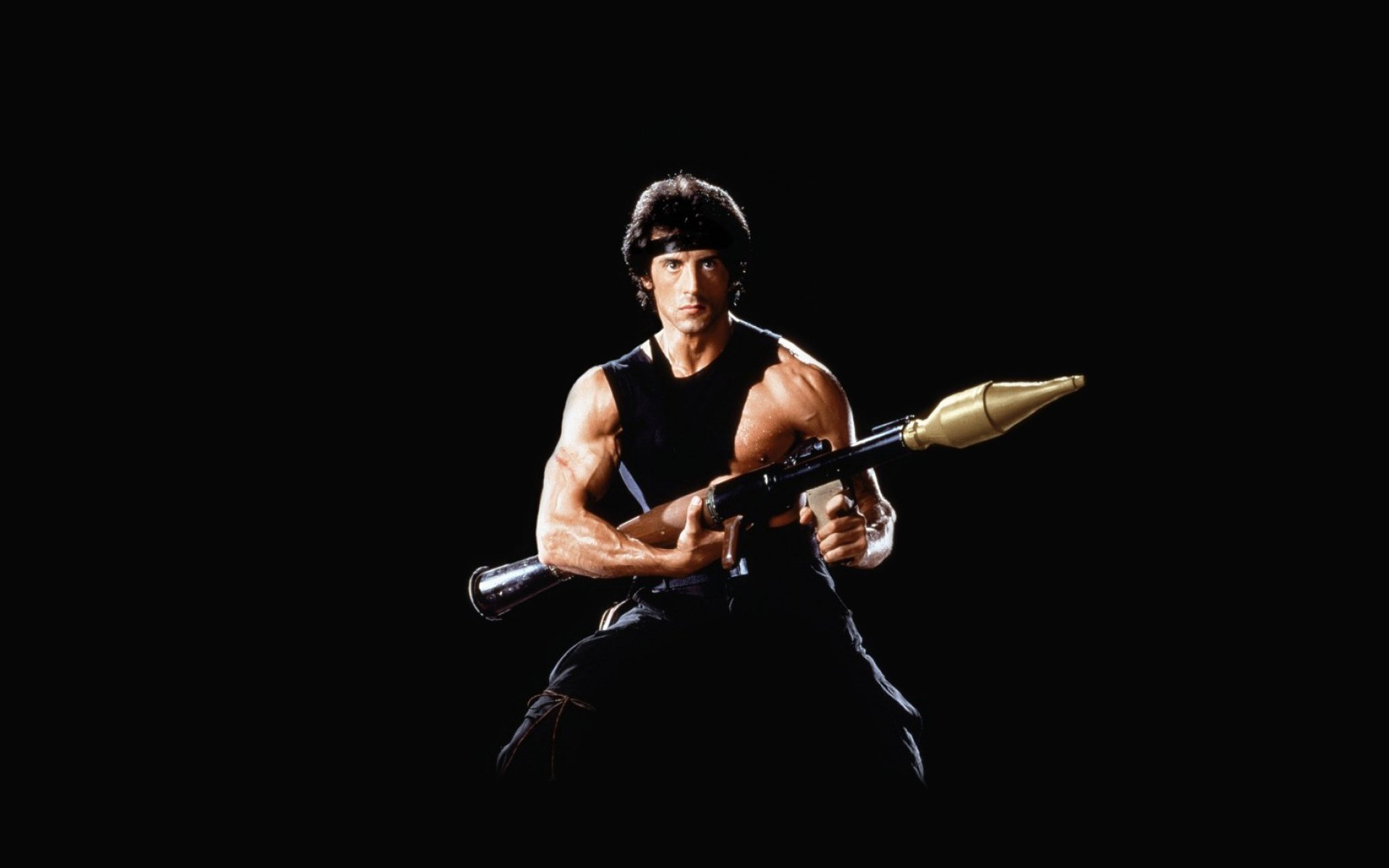 ylvester stallone pistol black background bazooka rambo