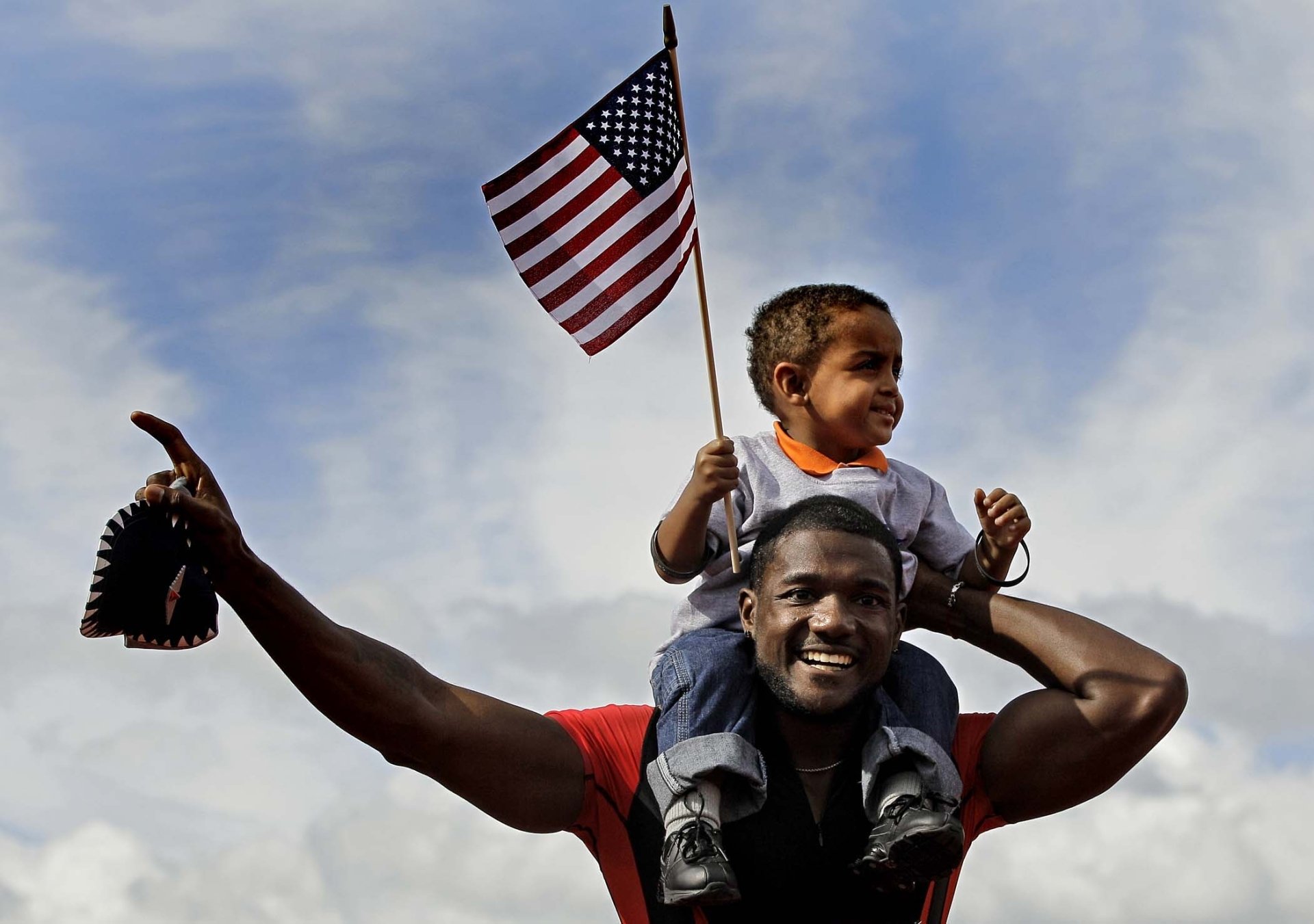 justin gatlin justin gatlin athlete runner sprinter man boy african americans blacks blacks flag sky