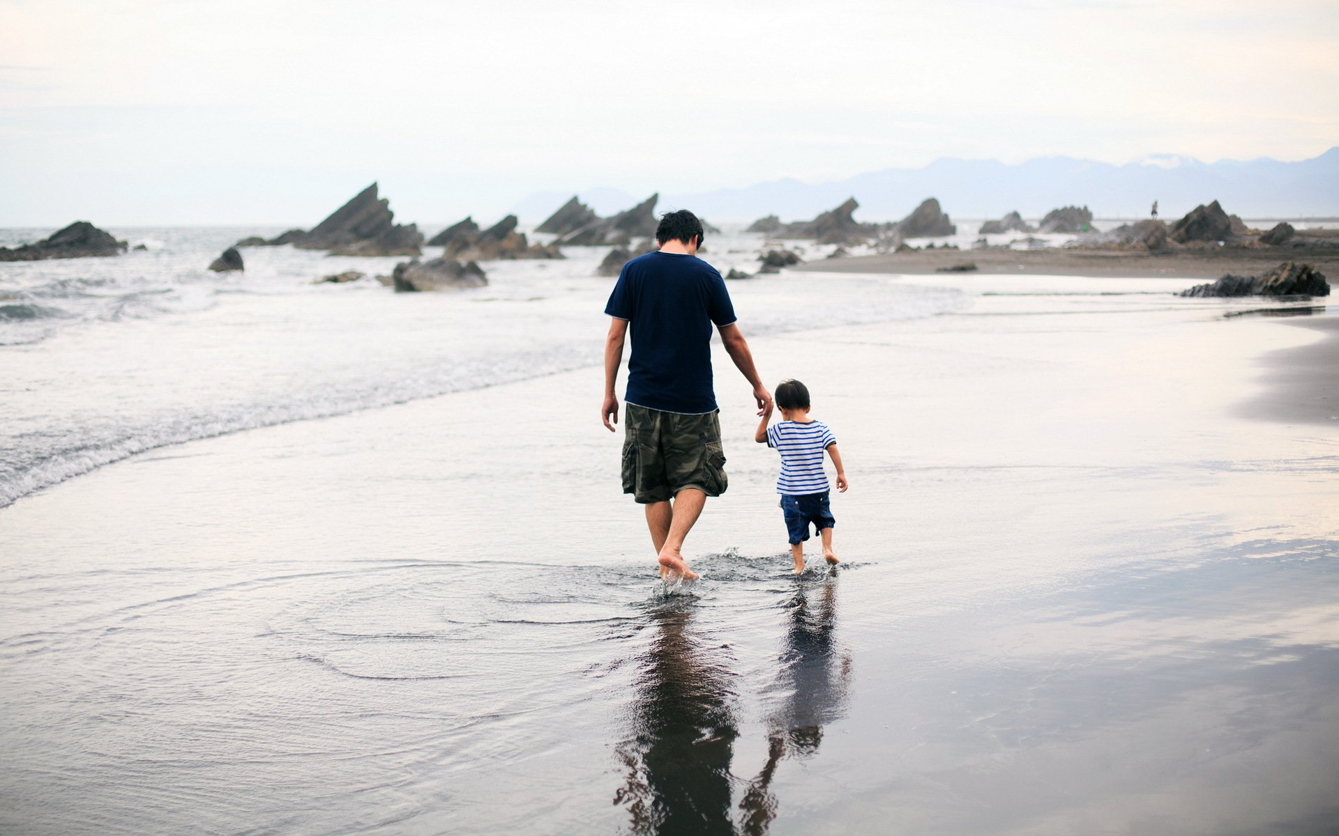 men sea beach walk