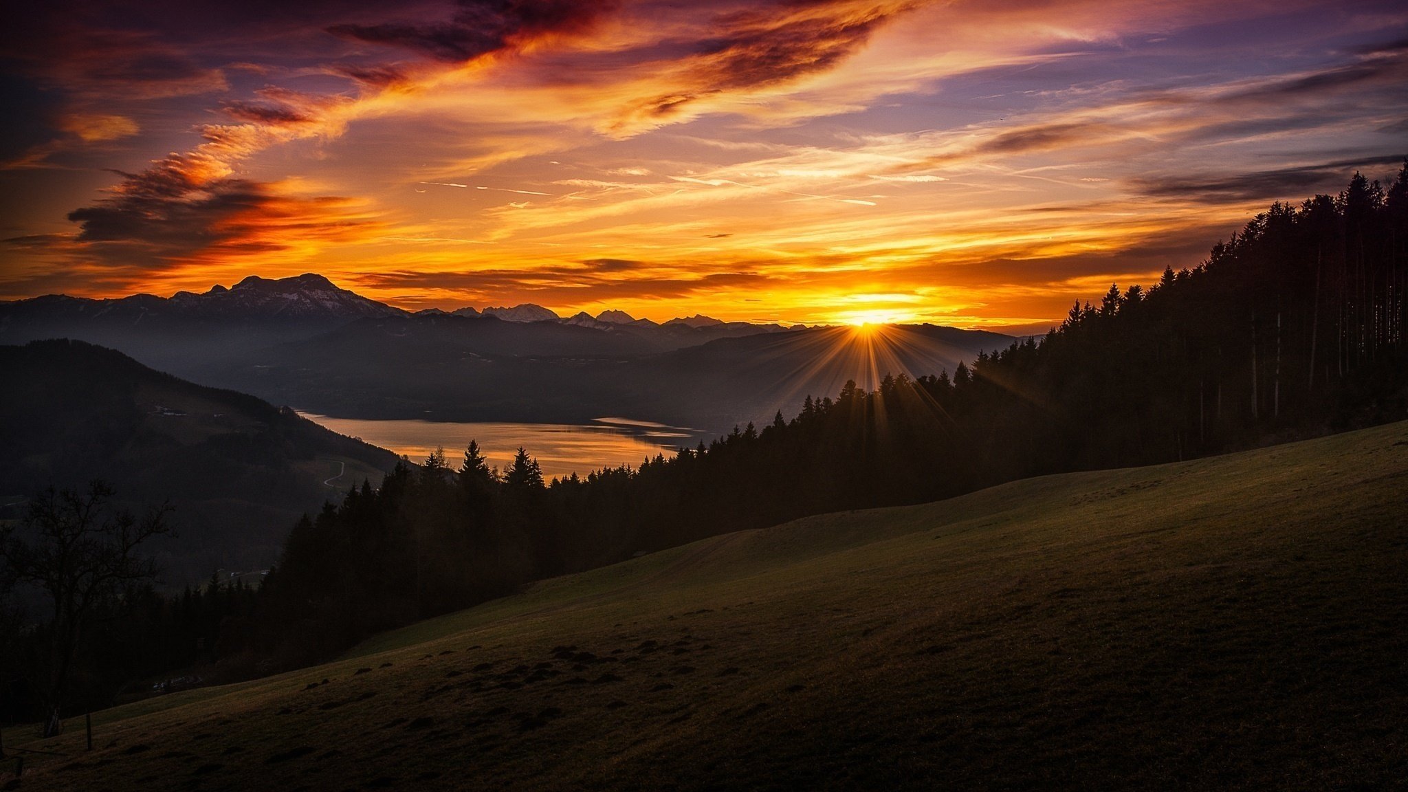 mountains sunset the sky the sun ray