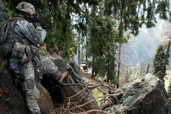 A soldier stands on a mountain cliff