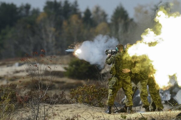 Soldiers blow up enemy trenches