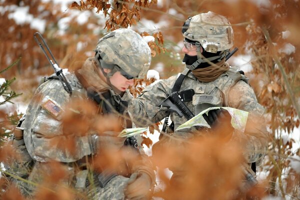 Two soldiers in the autumn forest