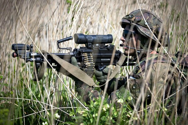 A soldier of the Royal Netherlands Army with a weapon